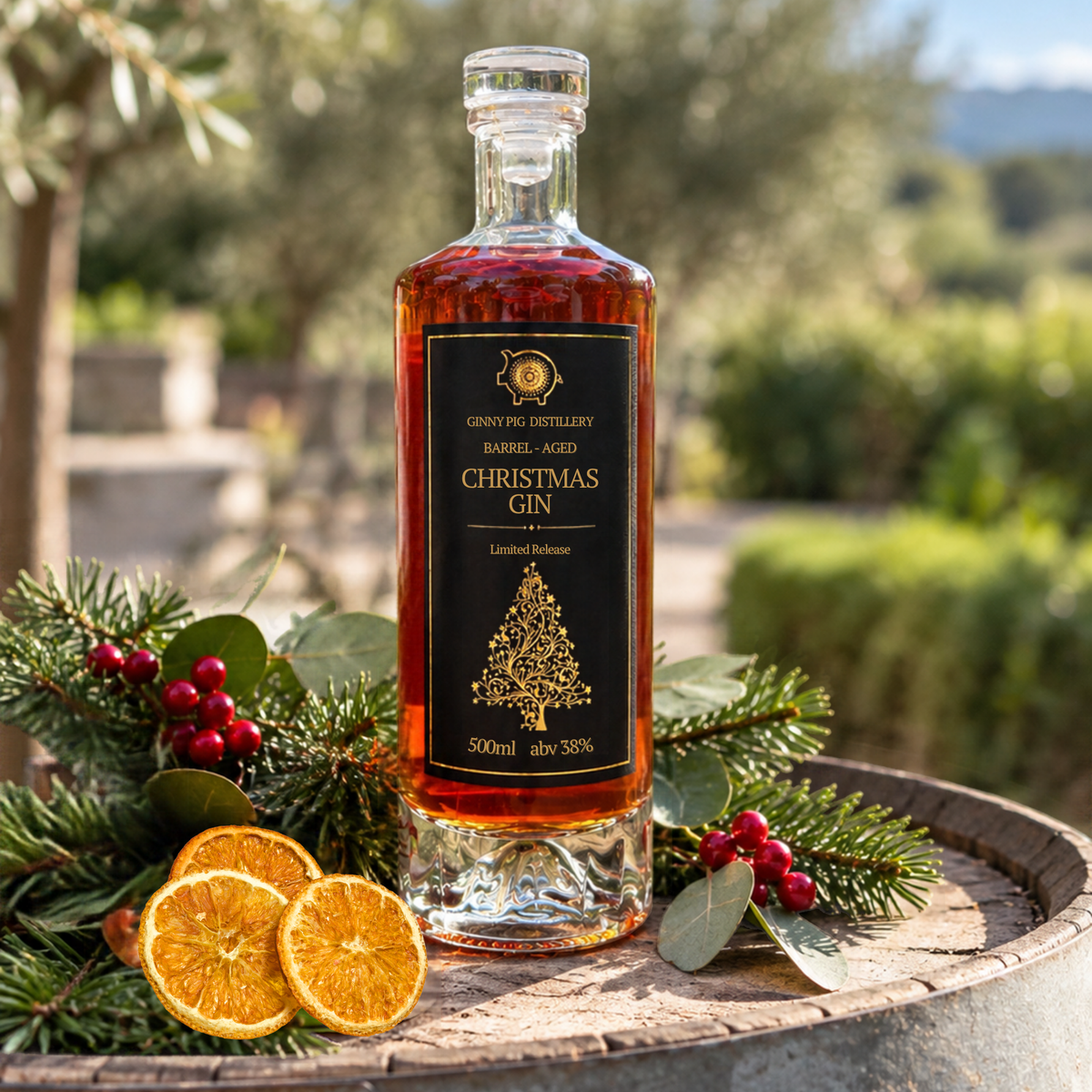 Bottle of Christmas gin sitting on top a wine barrel with Christmas decorations